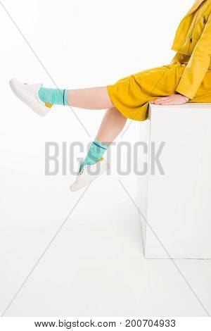 Girl Dressed In Yellow With Turqouise Socks