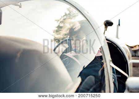 Pilot In The Aircraft Cockpit