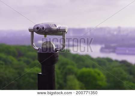 Hi Spy Viewing Machine On The Viewpoint Above The City In The Mist In Sunset