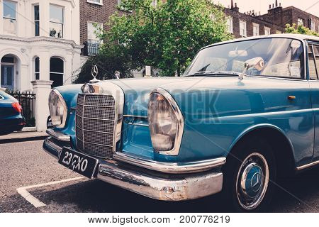 LONDON, UK - MAY 17, 2016: Old blue Mercedes-Benz 600 parked on a side of a road in London on a sunny day. The Mercedes-Benz 600 was produced from 1963 to 1981.