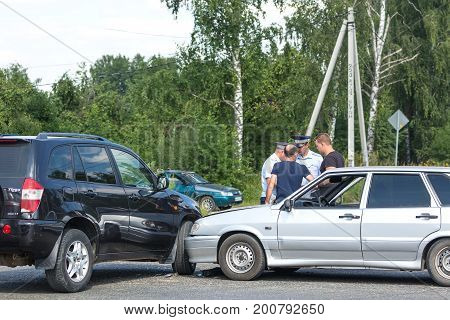 MOSCOW RUSSIA - AUGUST 2017: Car automobile crash from car accident on the road in a city with police and crash participants