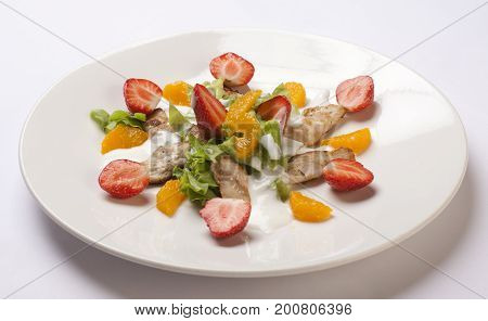 Light Meat And Fruit Salad. A Combination Of Strawberries, Fillets And Yogurt.