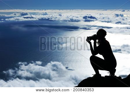 Photographer on the crater of Pico Volcano, Pico Island, Azores, Portugal, Europe