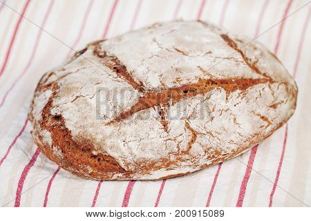 Homemade rye bread on a traditional cloth