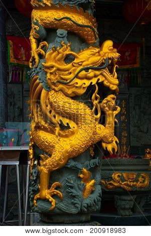 Golden Dragon On The Pole. Tua Pek Kong Chinese Temple. Bintulu City, Borneo, Sarawak, Malaysia