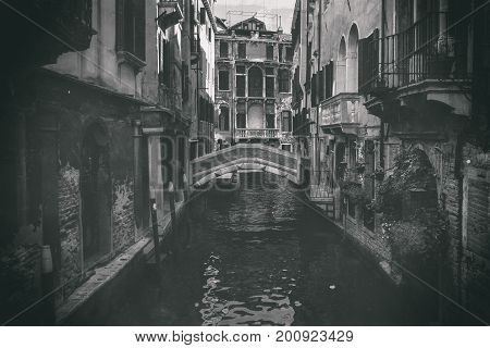 A glimpse of a Canal in Venice an antique photo to connote a concept of ancient culture and tourism history