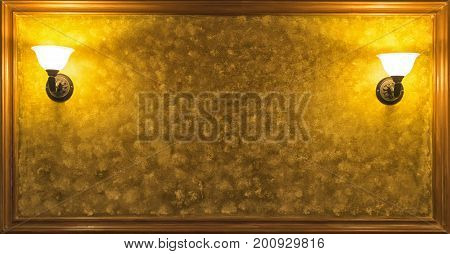 Old Vintage Lamp On The Wall With Framed Yellow Background