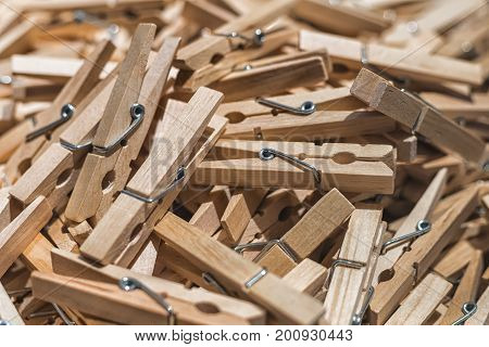Picture of Wooden clothes pins texture close up.