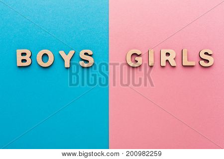 Words Boys and Girls on bright backgrounds. Unknown baby gender, uncertainty and doubt concept
