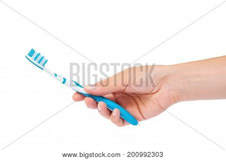 Hand holding tooth brush isolated on white background.
