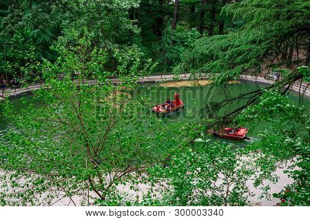 Manali, Himachal Pradesh, India - May 07, 2019 : Tourist Enjoying Boat Ride In Van Vihar National Pa