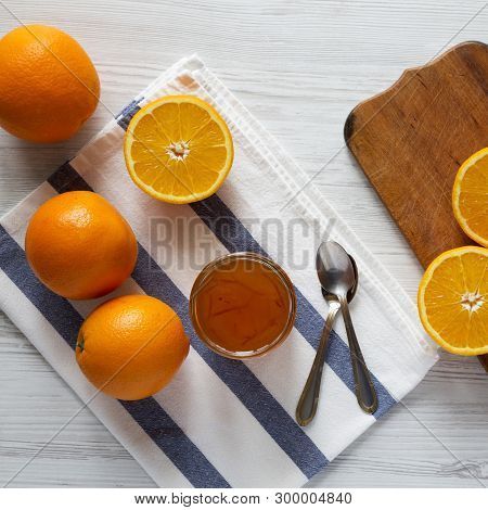 Homemade Orange Marmelade On A White Wooden Surface, Top View. Flat Lay, Overhead, From Above.