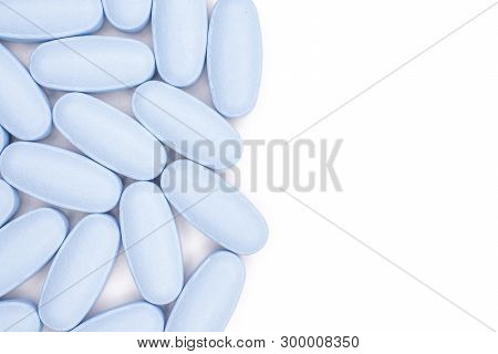 Lot Of Whole Blue Medical Drug With Copyspace Flatlay Isolated On White Background