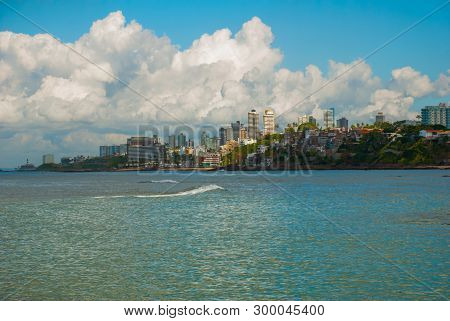 Salvador, Bahia, Brazil: City View With Modern Houses, Skyscrapers And The Sea In Sunny Weather.