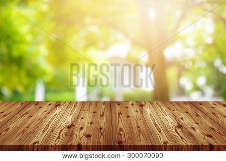 Emtry Wooden Table On Top Over Blur Natural Background, Can Be Used Mock Up For Montage Products Dis