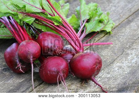 Fresh Beetroot On Rustic Wooden Background. Harvest Vegetable Cooking Conception . Diet Or Vegetaria