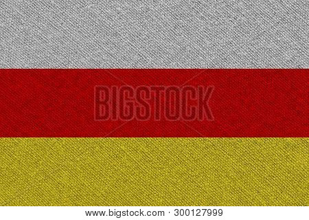South Ossetia Fabric Flag. Patriotic Background. National Flag Of South Ossetia