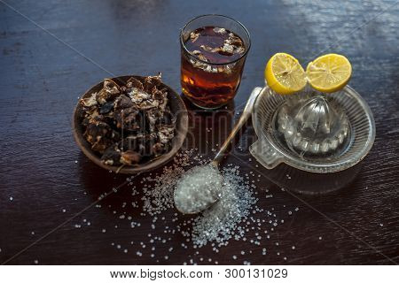 Ayurvedic  Face Pack Of Tamarind Or Imli Or Amli Consisting Of Sugar And Lemon Juice Also On Wooden