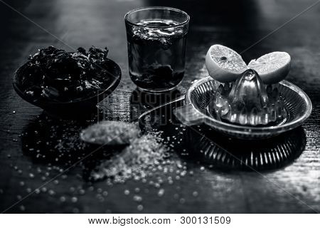 Ayurvedic  Face Pack Of Tamarind Or Imli Or Amli Consisting Of Sugar And Lemon Juice Also On Wooden