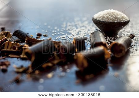 Raw Organic Golden Shower Tree Fruit Or Garmalo Sticks Or Indian Laburnum Pulp In A Glass Bowl With