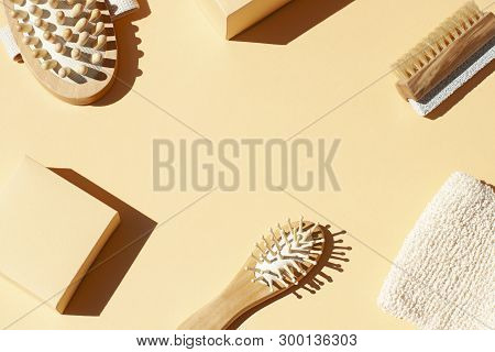 Bathroom, Spa Accessories Concept Flat Lay On The Beige Background. Top View Frame With Hairbrush , 