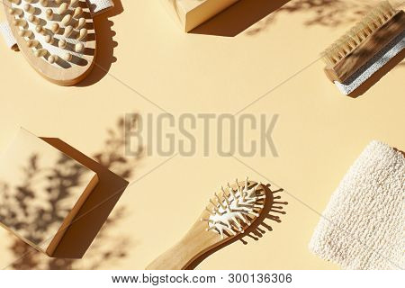 Bathroom, Spa Accessories Concept Flat Lay On The Beige Background. Top View Frame With Hairbrush , 