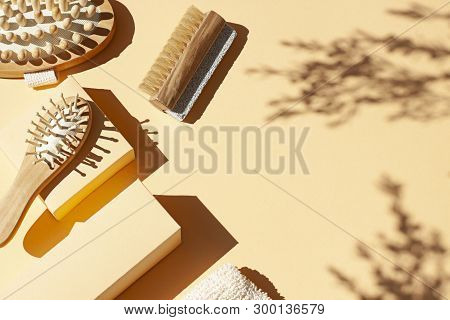 Bathroom, Spa Accessories Concept Flat Lay On The Beige Background. Top View Frame With Hairbrush , 