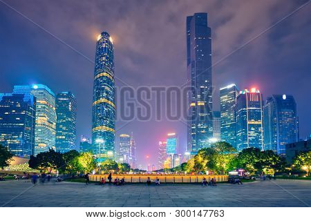 Guangzhou cityscape skyline Flower City Square illuminated in the evening. Guangzhou, China