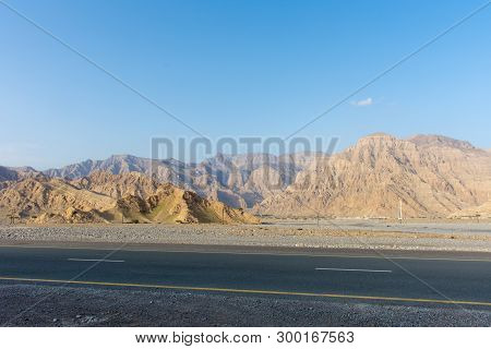 Driving Along Jebal Jais Mountain Road In Ras Al Khaimah, United Arab Emirates (uae) As The Sun Sets