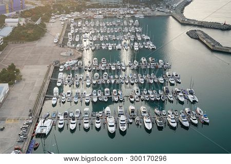 Yatch Harbor Marina Pier And Boat Dock Yatchs And Vessels Awaiting The Open Sea. Aerial Drone View L