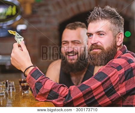 Hipster Brutal Bearded Man Spend Leisure With Friend At Bar Counter. Men Relaxing At Bar. Friendship