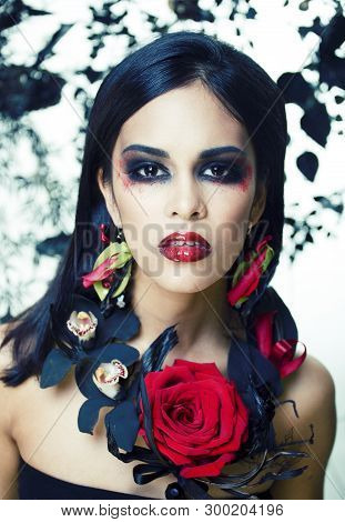 Pretty Brunette Woman With Rose Jewelry, Black And Red, Bright Make Up Kike A Vampire Closeup Red Li
