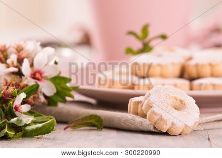 Canestrelli Biscuits With Mint On Wooden Table.