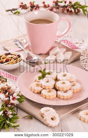 Canestrelli Biscuits With Mint On Wooden Table.