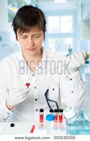 Scientist Works With Scientific Or Medical Samples In The Lab