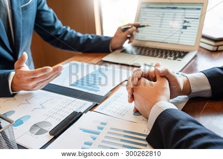 Teamwork Company Meeting Concept, Business Partners Working With Laptop Computer Together Analysing 