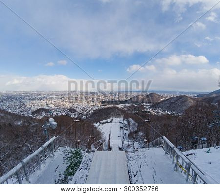 Ski Jump Stadium Are Covered With Snow From Top View In Winter.