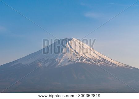 Snow Covered Mt. Fuji With Blue Sky In Spring Season.