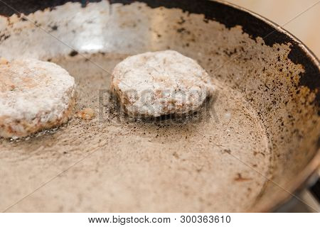 Cutlets Are Roasted In An Old Frying Pan. Buckwheat Cutlets. Buckwheat Cutlets Are Fried. Veggie Cut