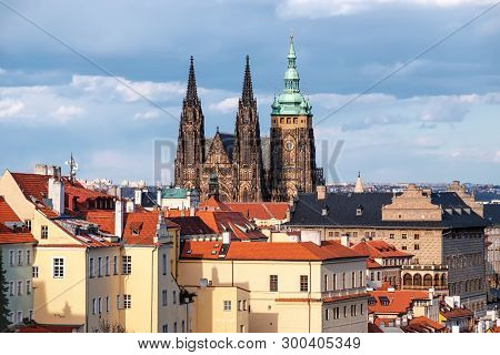 St. Vitus Cathedral And Roofs Of Old Prague With Dramatic Sky