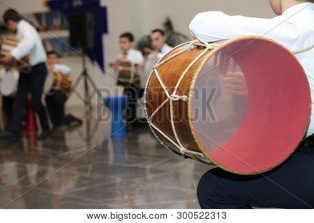 The National Instrument Of Azerbaijan Nagara . Children In National Costumes Play Drums . Young Azer