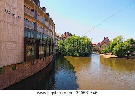 Nurnberg, Germany-may 07, 2018: Cityscape From River Pegnitz In Nurnberg, With Living Houses On Shor