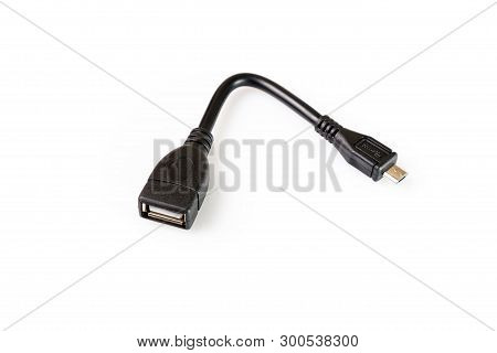 Black Usb-otg Adapter Cable Connector On White Background. Close-up
