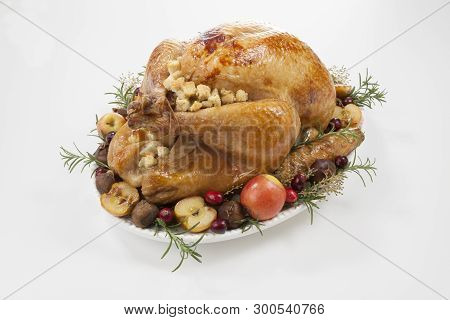 Roasted Turkey With Grab Apples Over White