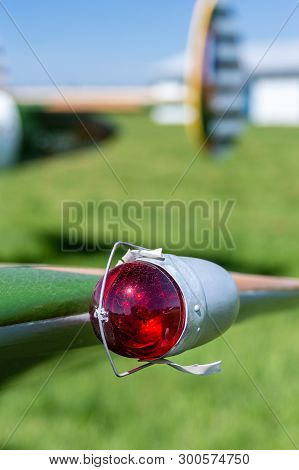 Red Vintage Left Side Aviation Navigation Light On Wing Tip.