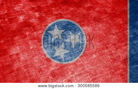 The National Flag Of The Us State Tennessee In Against A Gray Textile Rag On The Day Of Independence