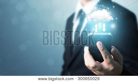 Cloud Computing And Technology Network Connection Concept. Businessman Hand Holding Mobile Smart Pho