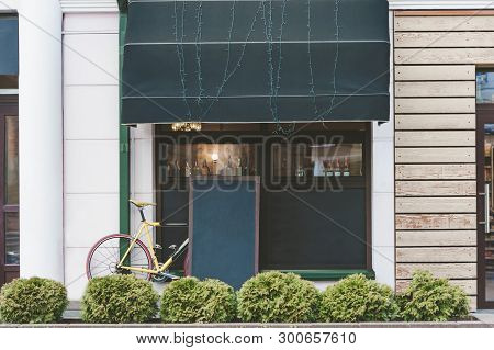 Mock Up Tables On The Background Of The Bike And Street Coffee.