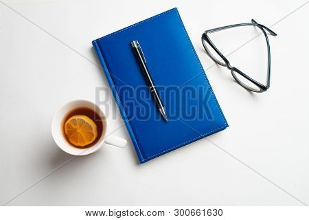 Notebook With Glasses And Pen, Book With Glasses, Blue Notebook With Glasses, Book With Cup Of Tea