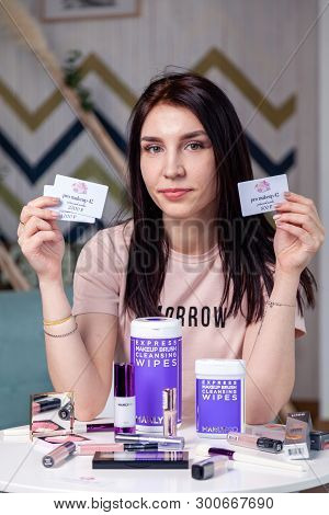 Russia Kemerovo 2019-04-15 Beautiful Caucasian Young Girl Hold Business Cards, Different Makeup Cosm